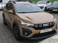 Gebraucht Dacia Sandero Expression 91 PS (66 kW) 2025 Safaribeige metallic Kleinwagen