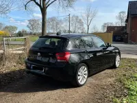 Gebraucht BMW 116 Sport Line 136 PS (100 kW) 2012 Schwarz Kleinwagen