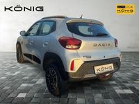 Gebraucht Dacia Spring Extreme 47 kW (65 PS) 2023 Diamantsilbergrau Kleinwagen