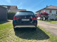 Używany BMW X1 xLine 177 KM (130 kW) 2011 Czarny SUV
