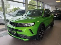 Gebraucht Opel Mokka Elegance 131 PS (96 kW) 2024 Lackierung matcha green/typ au SUV