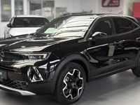 Gebraucht Opel Mokka-e Ultimate 100 kW (136 PS) 2021 Diamant schwarz/karbon schwarz SUV