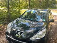 Gebraucht Peugeot 206 75 PS (55 kW) 2010 Schwarz Kleinwagen