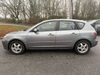 Używany Mazda 3 Comfort 105 KM (77 kW) 2004 Szary Sedan/Limuzyna
