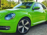 Gebraucht VW Beetle Exclusive 105 PS (77 kW) 2013 Grün Kleinwagen