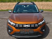 Gebraucht Dacia Sandero Expression 101 PS (74 kW) 2023 Orange Kleinwagen