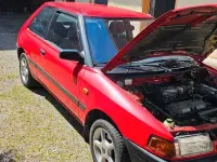 Gebraucht Mazda 323 73 PS (53 kW) 1992 Rot Kleinwagen