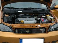 Second-hand Opel Astra 158 CP (116 kW) 2000 Galben Coupe