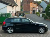 Gebraucht BMW 116 122 PS (89 kW) 2010 Schwarz Kleinwagen
