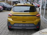 Neu Dacia Sandero Expression 110 PS (80 kW) 2026 Amber yellow Limousine