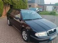 Używany Skoda Octavia 102 KM (75 kW) 2002 Czarny Kombi