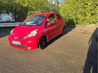 Gebraucht Toyota Aygo 68 PS (50 kW) 2010 Rot Kleinwagen