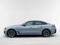 Gebraucht BMW i4 M Sport 350 kW (476 PS) 2023 M brooklyn grau metallic Limousine