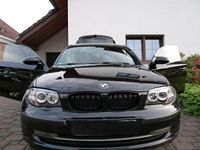 Second-hand BMW 116 Performance 122 CP (89 kW) 2009 Negru Hatchback