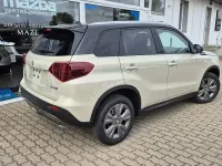 Gebraucht Suzuki Vitara Comfort 110 PS (80 kW) 2025 Savannah ivory / cosmic black SUV
