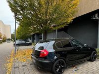 Gebraucht BMW 116 122 PS (89 kW) 2010 Schwarz Kleinwagen