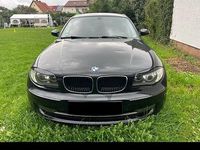 Gebraucht BMW 116 122 PS (89 kW) 2009 Schwarz Kleinwagen