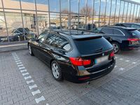 Gebraucht BMW 320 184 PS (135 kW) 2013 Schwarz Kombi