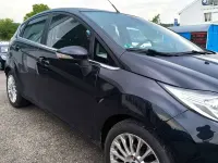 Gebraucht Ford Fiesta Titanium 101 PS (74 kW) 2012 Pantherschwarz metallic Kleinwagen
