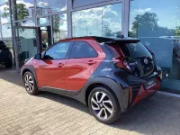 Gebraucht Toyota Aygo X Team 72 PS (52 kW) 2024 Chili red / night sky black SUV