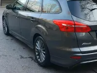 Używany Ford Focus Titanium 125 KM (91 kW) 2018 Brązowy Kombi
