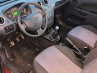 Używany Ford Fiesta 90 KM (66 kW) 2007 Pomarańczowy Hatchback