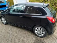 Używany Opel Corsa OPC 90 KM (66 kW) 2009 Czarny Hatchback