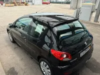 Gebraucht Peugeot 206 75 PS (55 kW) 2012 Schwarz Kleinwagen