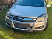 Usata Opel Astra 115 CV (84 kW) 2011 Argento Utilitaria