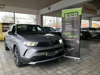 Gebraucht Opel Mokka-e Ultimate 100 kW (136 PS) 2022 Kontrast grau/quarz silber SUV