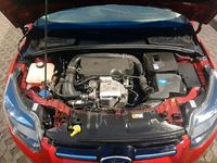 Używany Ford Focus 100 KM (73 kW) 2014 Czerwony Sedan/Limuzyna