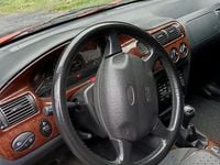 Gebraucht Ford Escort Ghia 115 PS (84 kW) 1998 Schwarz Limousine