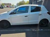 Gebraucht Mitsubishi Space Star 71 PS (52 kW) 2015 Weiß Kleinwagen