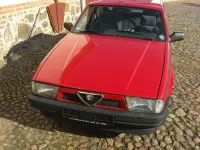 Używany Alfa Romeo 75 120 KM (88 kW) 1990 Czerwony Sedan/Limuzyna