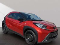 Gebraucht Toyota Aygo Connect Style 72 PS (52 kW) 2022 3u4)/ black mica (209) (rot Kleinwagen