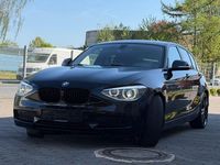 Second-hand BMW 118 Comfort Edition 143 CP (105 kW) 2014 Negru Hatchback