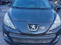 Gebraucht Peugeot 207 73 PS (53 kW) 2011 Schwarz Kleinwagen