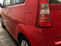 Gebraucht Daihatsu Cuore 53 PS (38 kW) 2004 Rot Kleinwagen
