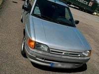 Używany Ford Escort 60 KM (44 kW) 1992 Srebrny Sedan/Limuzyna