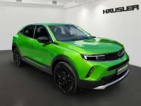 Gebraucht Opel Mokka Elegance 131 PS (96 kW) 2022 Matcha green/ikone gruen SUV
