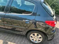 Gebraucht Peugeot 206+ 77 PS (56 kW) 2009 Grau Kleinwagen
