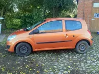 Gebraucht Renault Twingo 58 PS (42 kW) 2007 Orange Kleinwagen
