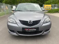 Używany Mazda 3 Comfort 105 KM (77 kW) 2004 Szary Sedan/Limuzyna