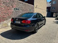Gebraucht VW Jetta Comfortline 105 PS (77 kW) 2011 Schwarz Limousine