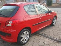 Gebraucht Peugeot 206 Basis 75 PS (55 kW) 2010 Rot Kleinwagen