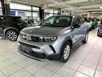 Gebraucht Opel Mokka-e Edition 100 kW (136 PS) 2023 Kontrast grau/quarz silber SUV