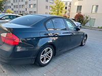 Second-hand BMW 318 129 CP (94 kW) 2007 Negru Berlinǎ