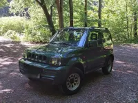 Gebraucht Suzuki Jimny 85 PS (62 kW) 2011 Grün SUV