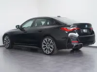 Używany BMW i4 Performance 400 kW (544 KM) 2024 Czarny Sedan/Limuzyna