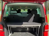 Używany VW T5 114 KM (83 kW) 2015 Czerwony Van